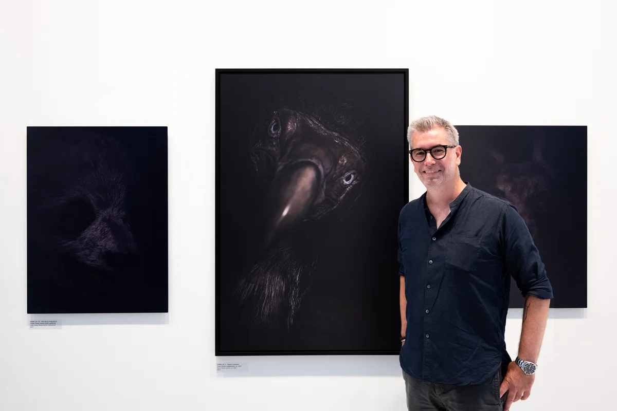Florian W. Müller in front of his work at EQUILIBRIUM, his solo exhibition. Florian W. Müller in front of his work at EQUILIBRIUM, his solo exhibition.