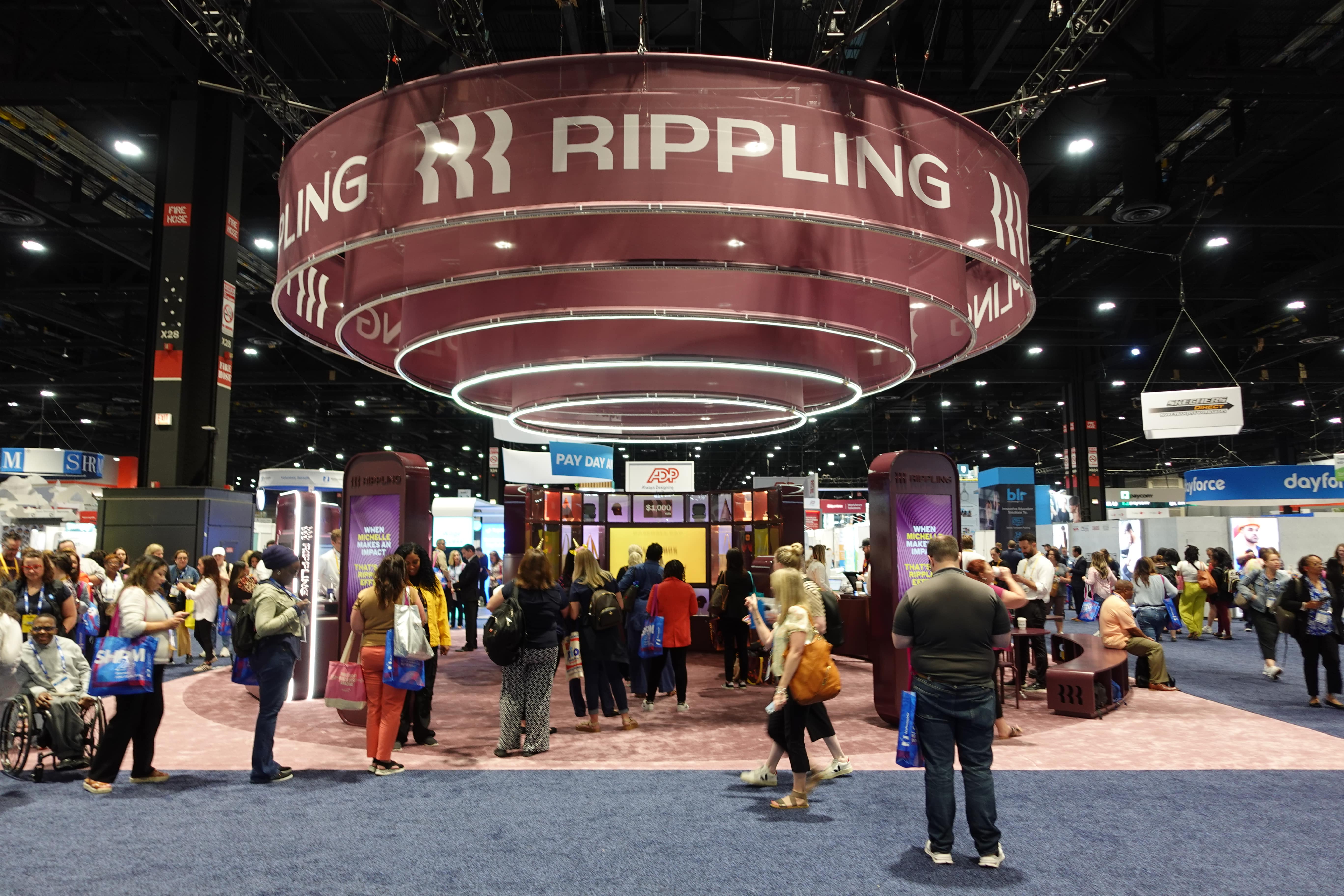 Photograph of the Rippling booth at the SHRM conference