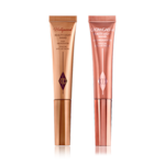 Beauty Light Wands duo closed A highlighter wand and a highlighter blush wand with reflective packaging in rose gold and honey-gold shades.