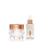 Magic Serum and Magic Cream Bundle A pearly-white cream in a glass jar with a golden, metallic lid with a pearly white serum in a glass bottle with a rose gold and white dropper.