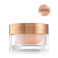 Multi Miracle Glow still life A 3-in-1 face fawn-coloured cleanser, mask, and balm in a glass jar with gold-coloured lid.