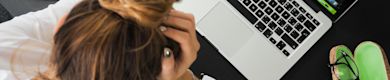 Student thinking and see her laptop