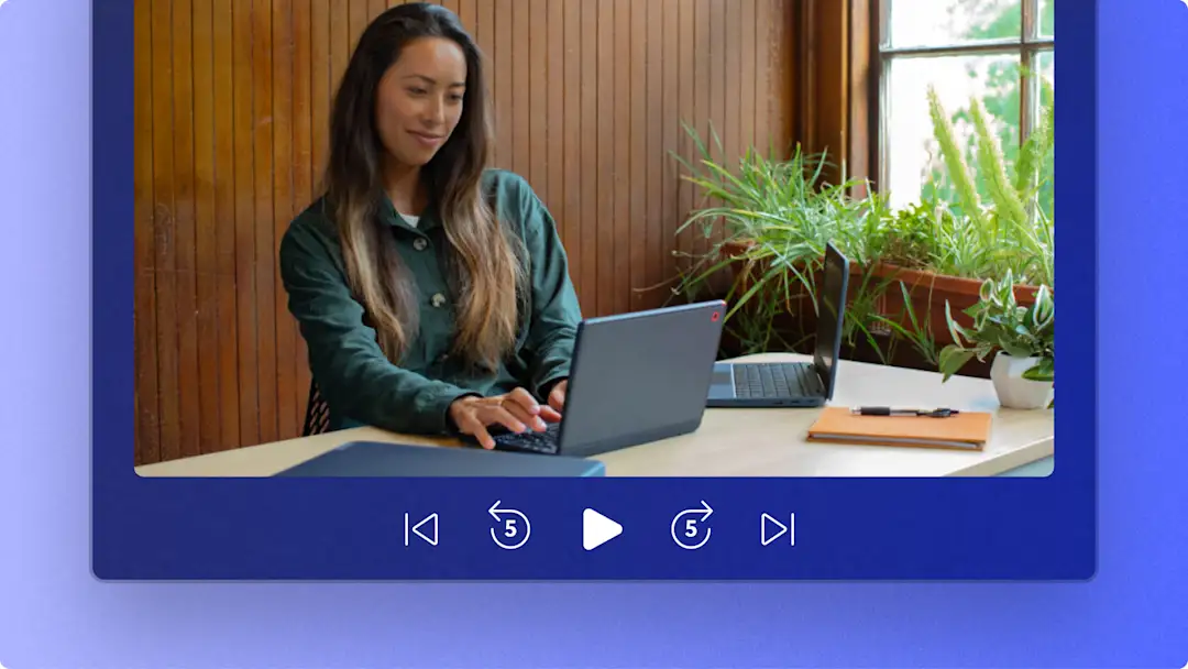 A working professional typing on a laptop inside an abstract preview window of the Clipchamp video editor.