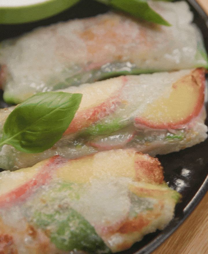 crispy peach prosciutto summer roll hero gif