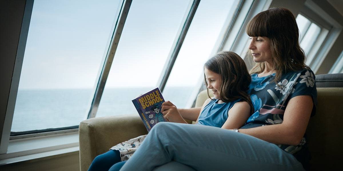 Family relaxing on Dover-Dunkirk ferry Family relaxing on deck Dover-Dunkirk