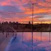 Sunset by the rooftop pool at Clarion Hotel Sign in Stockholm.