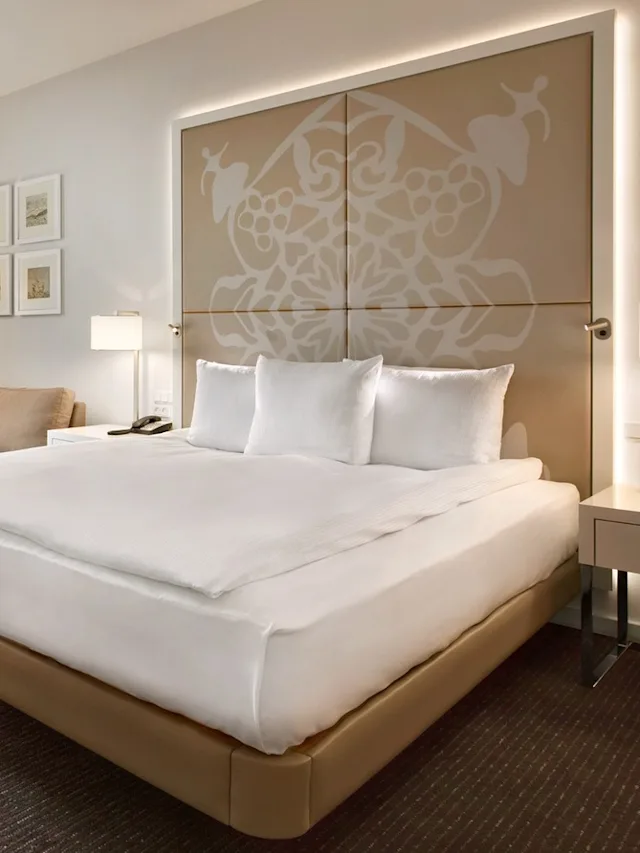 Bed at a Deluxe king room at Clarion Hotel Copenhagen Airport at Kastrup in Denmark.