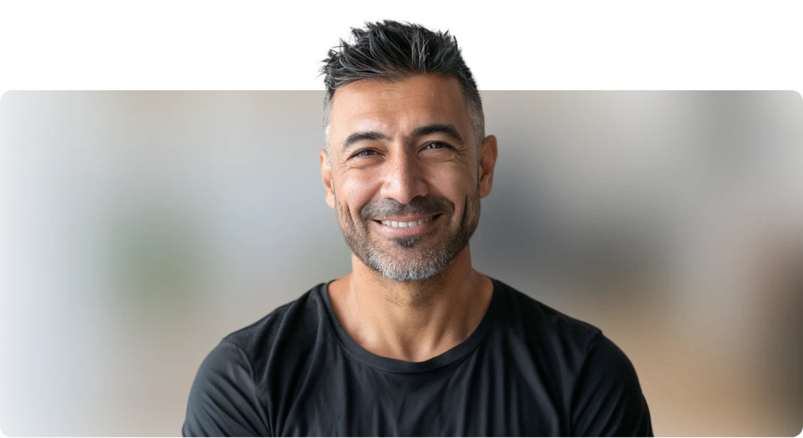 kind smiling man in black tee