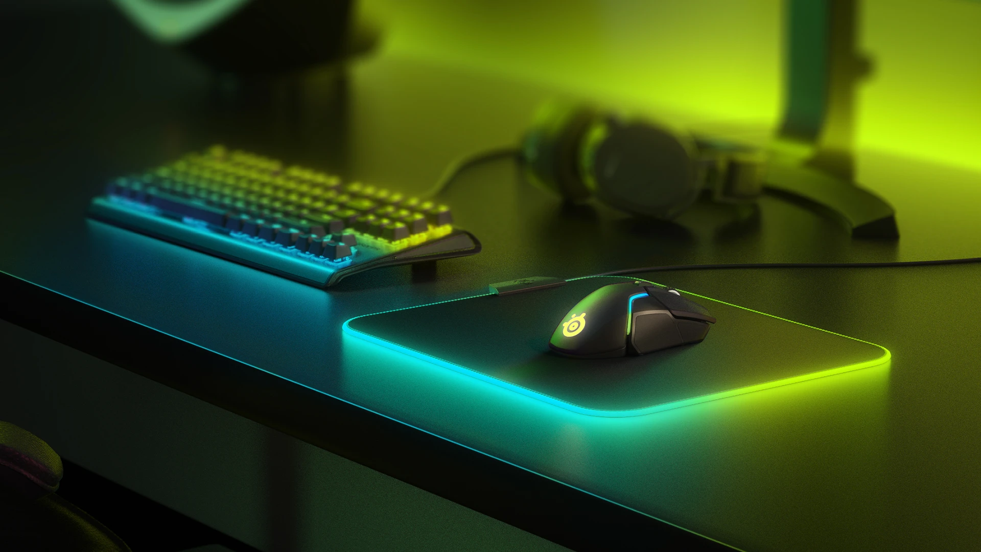 Gaming mouse;mousepads;keyboard and headset. RGB lights in the background.