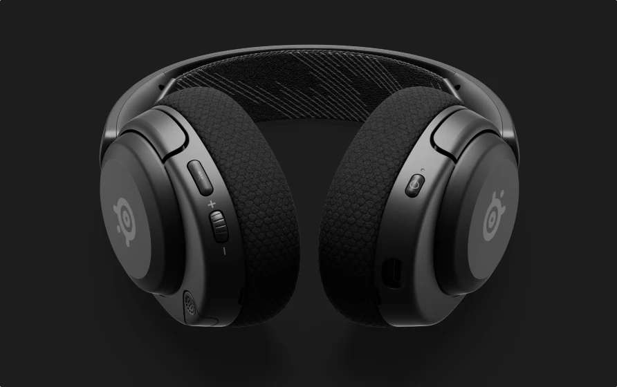 Close up view of the Arctis Nova 4 headset with control buttons on the headphones