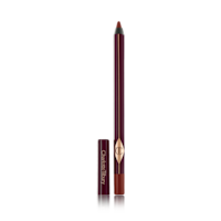 An eyeliner pencil in a berry-pink shade with its lid next to it.