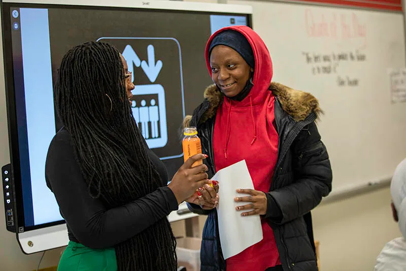 Fatima giving team's elevator pitch